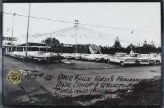 <em>ACT # 48 - Dave Buck Ford&#39;s Fluorescent Pink Canopy Structure Over Cars and Trucks, Marine Drive, Near 1st Narrows Bridge, N. Vanc. B.C.</em>