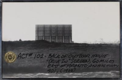 <em>ACT # 102 - Back of Outdoor Movie "Drive In" Screen, 60 Miles East of Toronto on Highway 401</em>